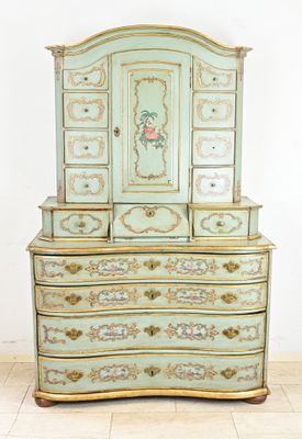an image of a dresser with a mirror on top of it