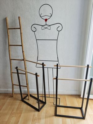 a drawing of a man standing next to a ladder