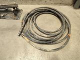 a lot of hoses that are laying on the floor
