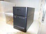 a black computer sitting on top of a white counter