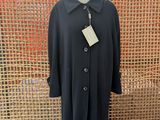 a black coat on a mannequin mannequin mannequin mannequin mannequin mannequin mannequin mannequin mannequin