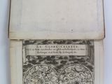 an old book with a map of the world inside of it