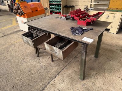 an image of a workbench with tools on top of it