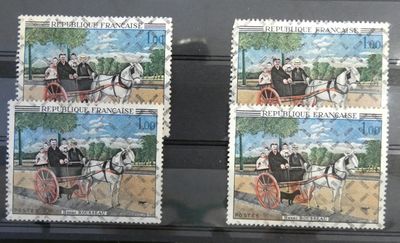 two stamps with a picture of a man and a woman on a horse drawn carriage