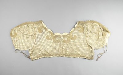 TUNISIE, XXe siècle Corsage beige et doré, en soie ivoire so…