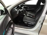 the interior of a car with the door open and the driver ' s seat up