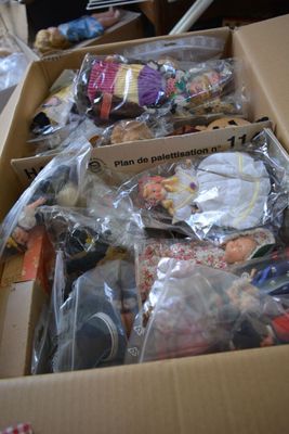 a box full of assorted items sitting on the floor