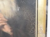 portrait of a man with a white beard and a gold frame