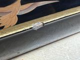 a picture of a bird painted on the side of a box