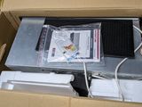 a cardboard box with a computer inside of it
