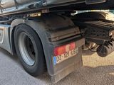 a large truck that is parked on the side of the road