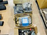 many boxes of assorted items sitting on the floor