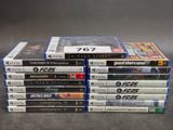 several video games stacked on top of each other on a table
