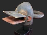 an image of a sculpture of a helmet on a black surface