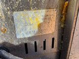 a close up view of a dirty old gas stove