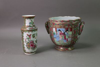 two vases sitting next to each other on a table