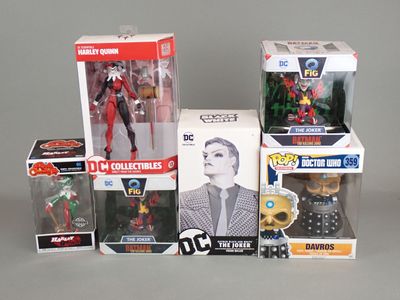 a lot of action figures that are in the box