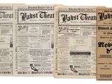 several old newspaper pages are stacked on top of each other