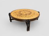 a wooden table with a circular design on top of it
