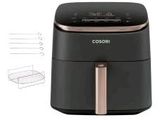 a close up of a black and gold air fryer on a white background