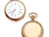 two gold pocket watches with roman numerals and roman numerals