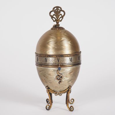 Pendulette de table anglaise en argent et métal en forme d'œ… - Photo 1