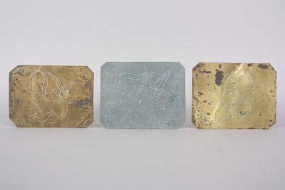 three gold, silver and blue soap bars