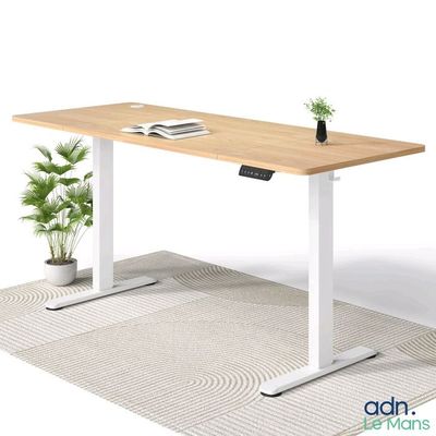 an image of a desk with a plant on top of it