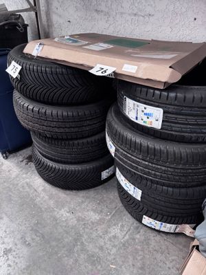 1 lot de 8 pneus de divers tailles et divers marques
