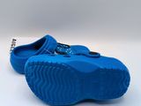 blue children ' s slippers on a white surface with a white background