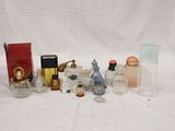 many bottles of perfume on a white surface