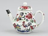 chinese porcelain teapot decorated with flowers and birds on a white background