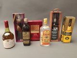 many different types of liquors and liquor bottles