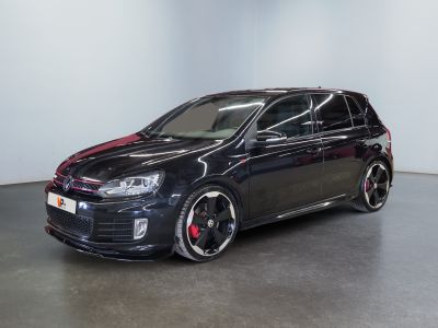 volkswagen golf gtr with a red stripe on the side of it