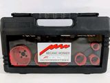 a black tool box filled with red and black tools