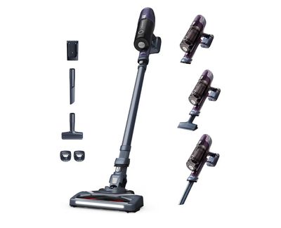 un gros plan d'un aspirateur sans fil équipé de plusieurs accessoires différents