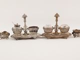 silver plated objects on a white surface with a white background