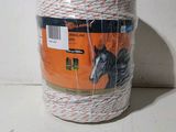 a roll of white and red rope with a horse on it