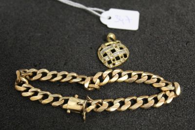 a close up of a gold chain bracelet and a gold chain bracelet