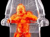a plastic figure of a man sitting in a chair