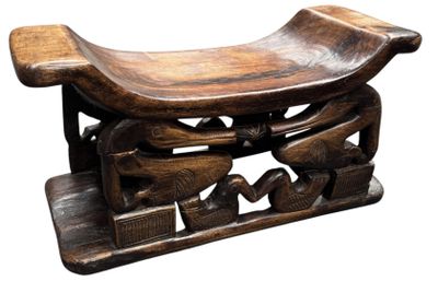 a wooden bench with carvings on it on a white background
