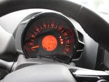 dashboard of a car with a speedometer and steering wheel