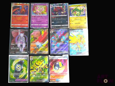a lot of pokemon cards that are on the table