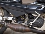a close up of a motorcycle that is parked on the street