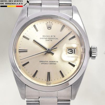 an image of a rolex watch with roman numerals on the dial