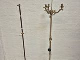 pair of antique brass candlesticks on stands
