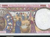 une photo d'un billet de banque sur lequel figurent un homme et une femme