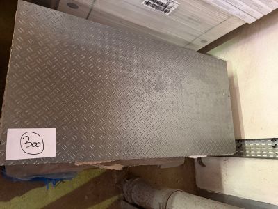 a picture of a piece of metal with a sticker on it