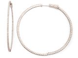 a close up of a pair of hoop earrings on a white background
