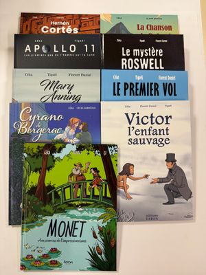 many books that are on the table together